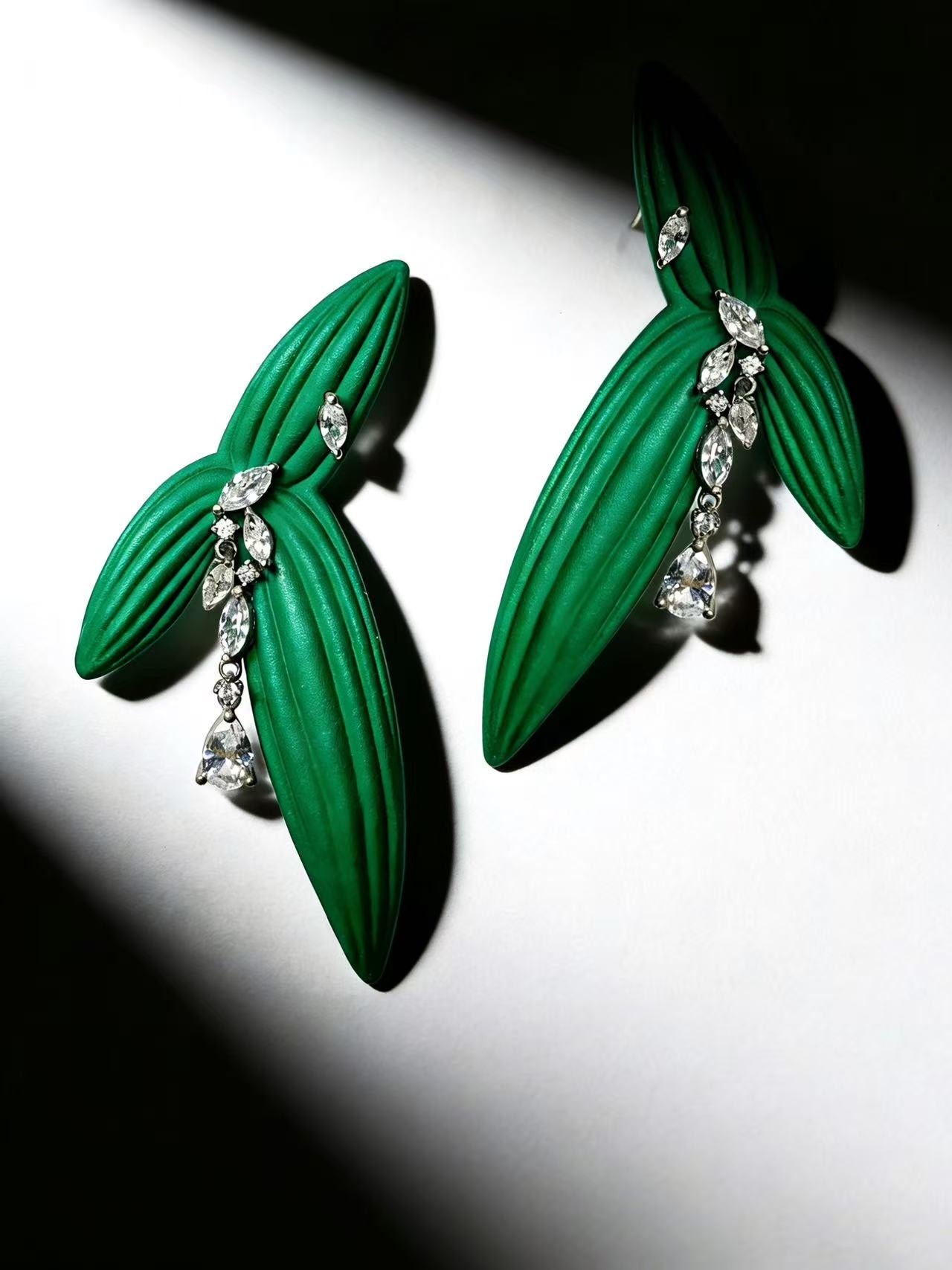 DeWDrop Gearing | Geometric Earrings Capturing Nature’s Fleeting Dewdrop Moment on Arrowhead Leaf